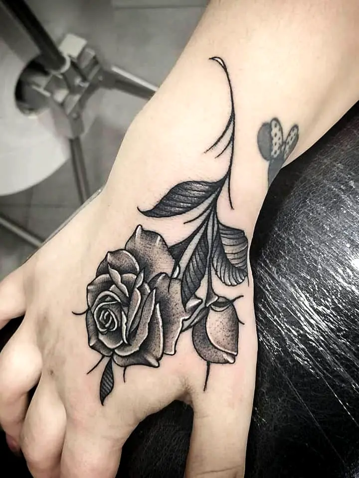 Rose tattoo on hand