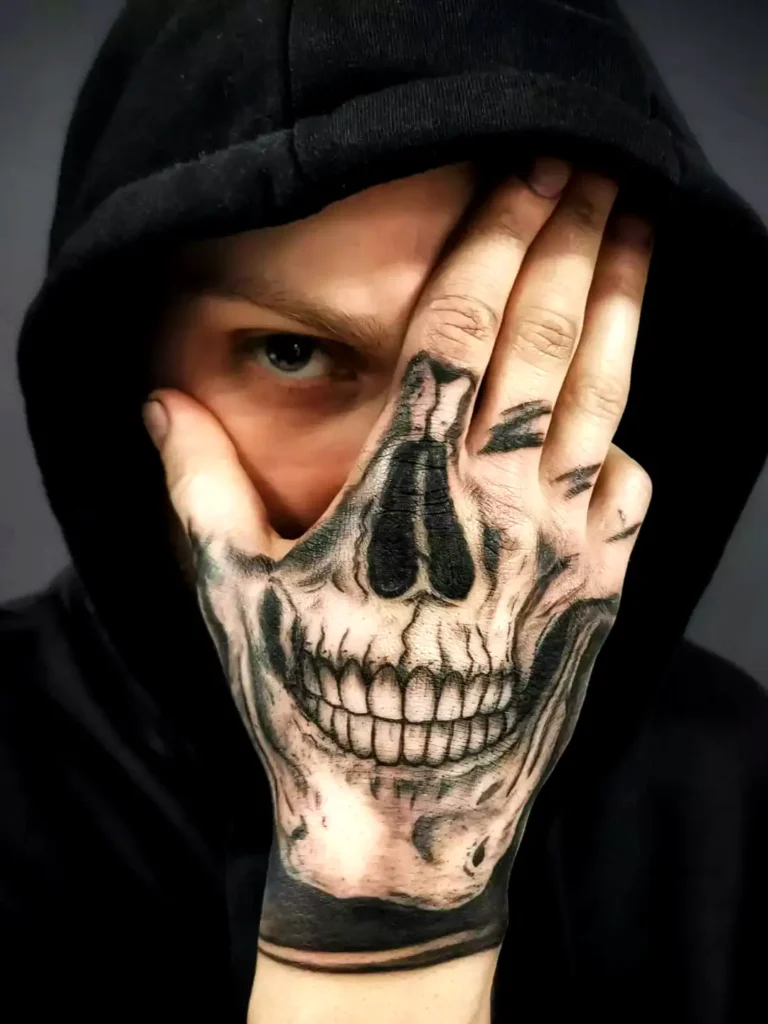 Skull tattoo on hand