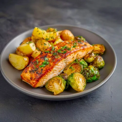Baked salmon with roasted Brussels sprouts and sweet potato