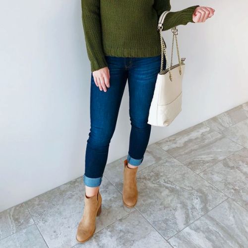 Dark brown jeans with an olive sweater